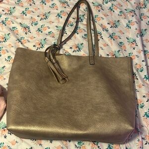 Large gold shoulder bag. I purchased from Belk
